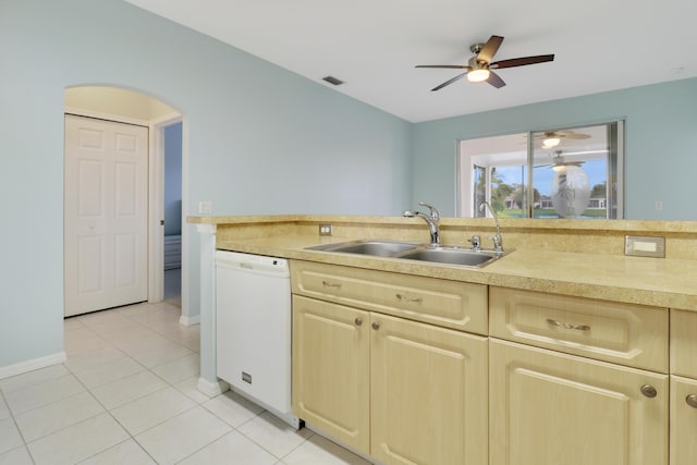 kitchen with ceiling fan, sink, white dishwasher, and light tile patterned floors