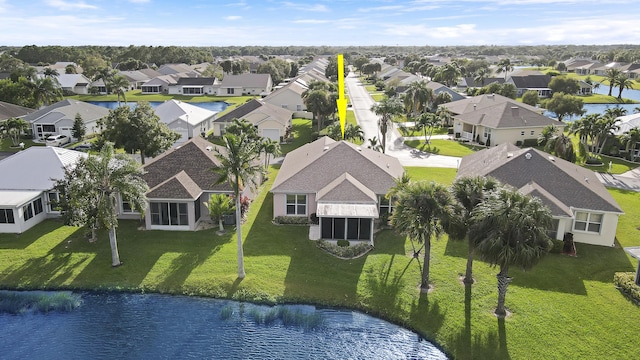 birds eye view of property featuring a water view