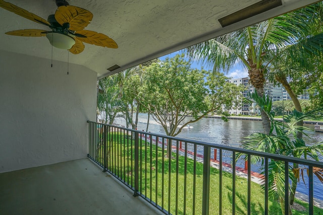 balcony featuring a water view