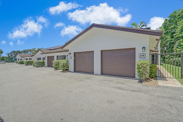 single story home with a garage