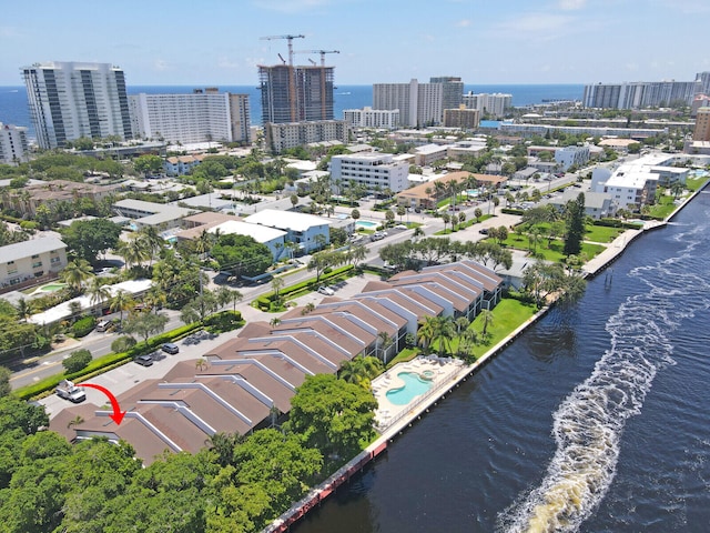 birds eye view of property featuring a water view