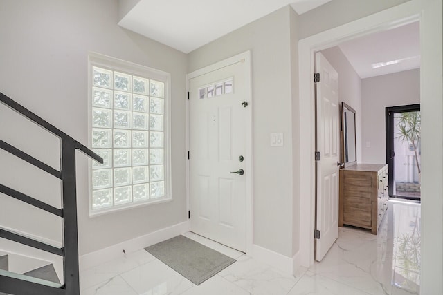 entrance foyer featuring a healthy amount of sunlight