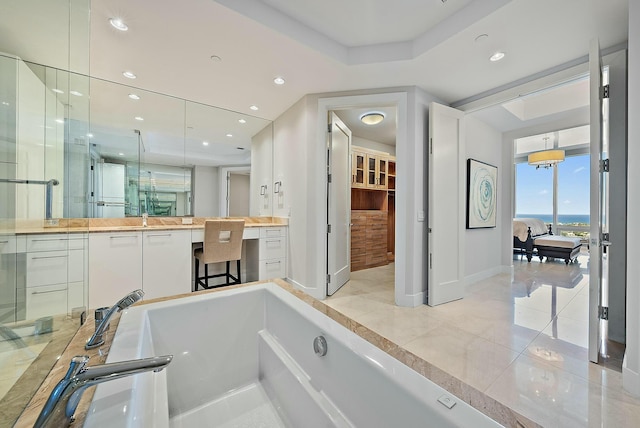 full bath with tile patterned flooring, recessed lighting, ensuite bathroom, a bath, and vanity