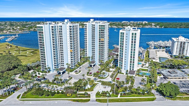 aerial view featuring a water view and a city view