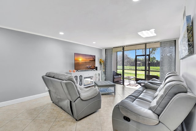 tiled living room featuring a fireplace, expansive windows, and ornamental molding