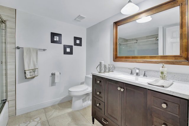 bathroom with tile patterned floors, vanity, toilet, and an enclosed shower