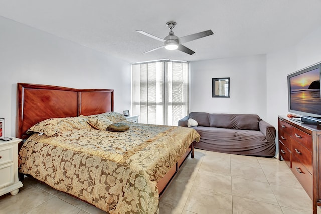 bedroom featuring ceiling fan and light tile patterned flooring