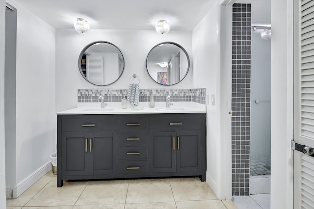 bathroom with tile patterned flooring and vanity