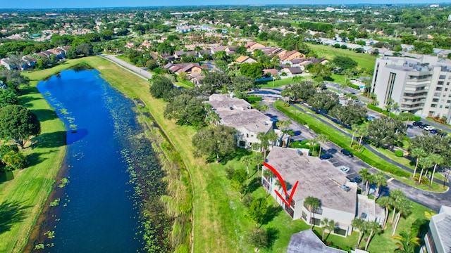 drone / aerial view with a water view