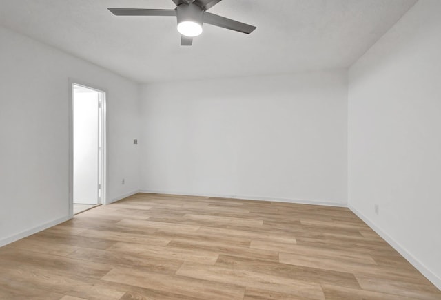 unfurnished room featuring ceiling fan and light hardwood / wood-style flooring