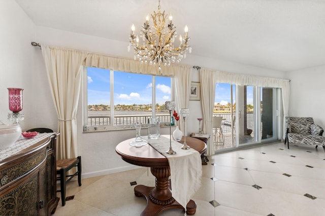 tiled dining area with a notable chandelier