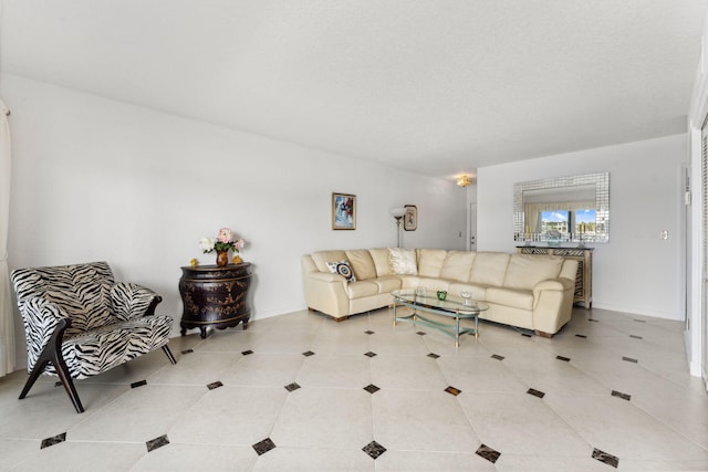 living room with tile patterned flooring