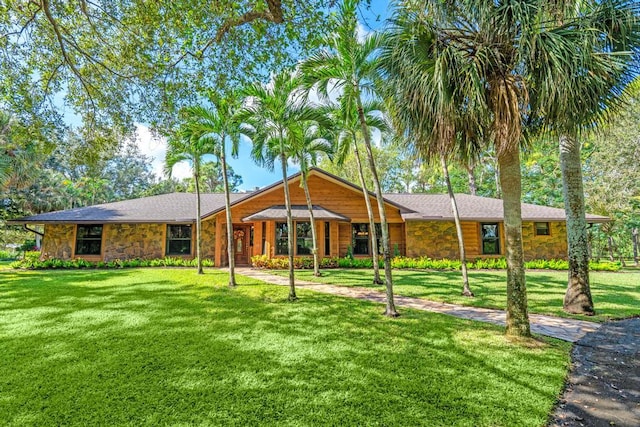 5405 Duckweed Rd, Wellington, FL 33449 - view of front facade with a front yard