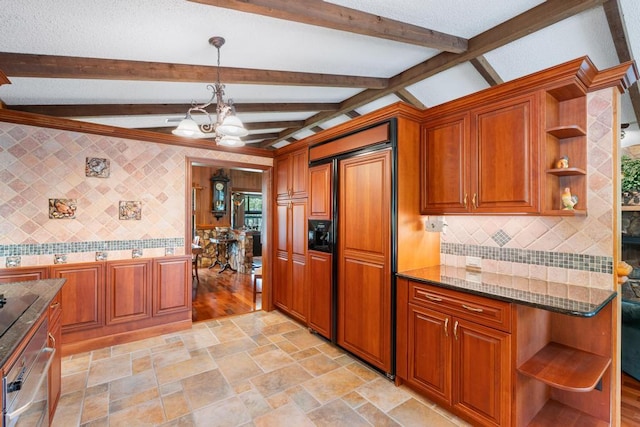 5405 Duckweed Rd, Wellington, FL 33449 - kitchen with pendant lighting, lofted ceiling with beams, paneled refrigerator, and a chandelier