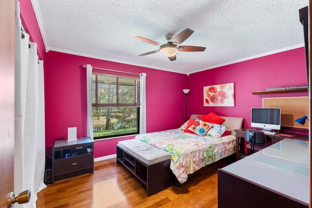 5405 Duckweed Rd, Wellington, FL 33449 - bedroom with hardwood / wood-style floors, a textured ceiling, ceiling fan, and crown molding