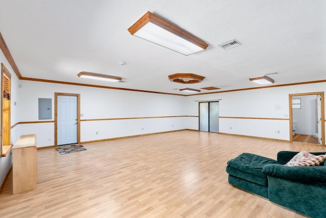 5405 Duckweed Rd, Wellington, FL 33449 - living room with electric panel, light hardwood / wood-style floors, and crown molding