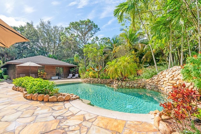 5405 Duckweed Rd, Wellington, FL 33449 - view of swimming pool with a patio