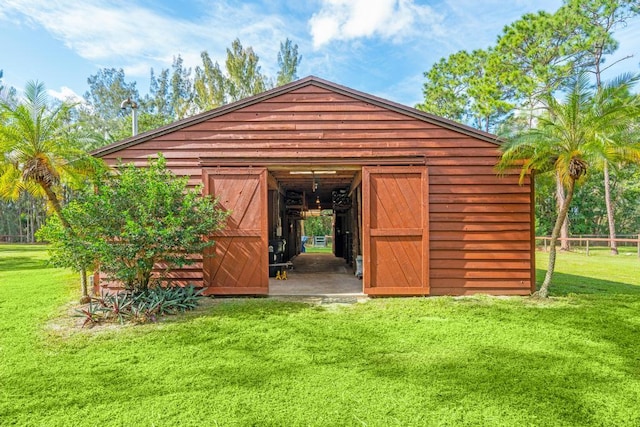 5405 Duckweed Rd, Wellington, FL 33449 - view of outdoor structure with a lawn