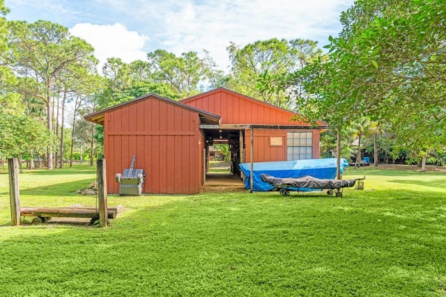 5405 Duckweed Rd, Wellington, FL 33449 - view of outbuilding featuring a yard