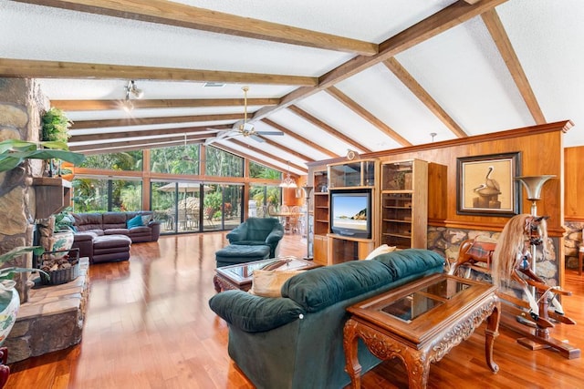 5405 Duckweed Rd, Wellington, FL 33449 - living room with vaulted ceiling with beams, ceiling fan, light hardwood / wood-style flooring, and wooden walls