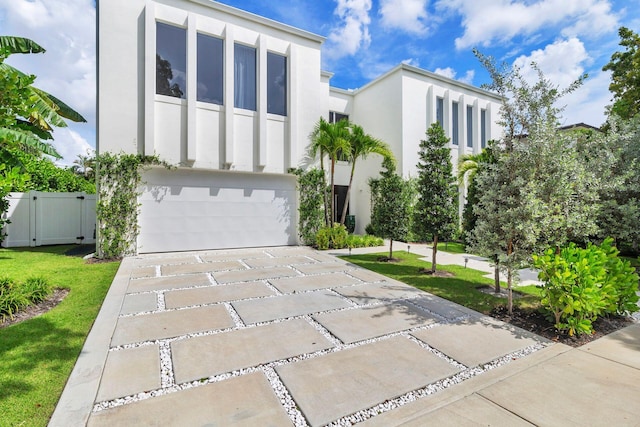 view of front of property featuring a garage