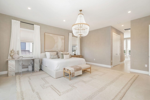 bedroom featuring an inviting chandelier