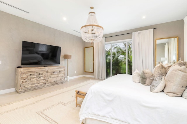 bedroom featuring a notable chandelier and access to outside