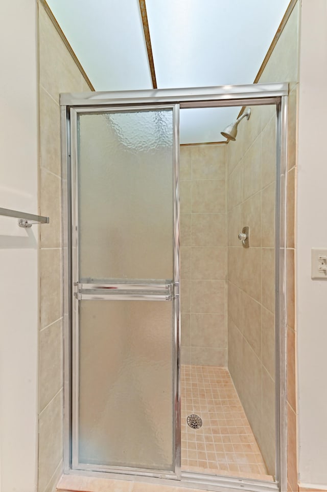 bathroom featuring an enclosed shower