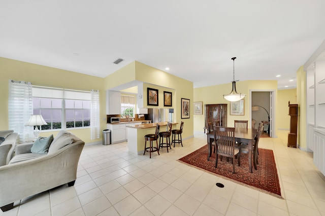 living room featuring light tile patterned floors