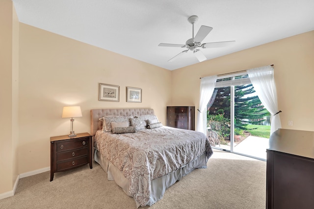 carpeted bedroom with access to outside and ceiling fan