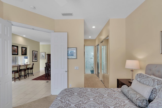 carpeted bedroom featuring a closet