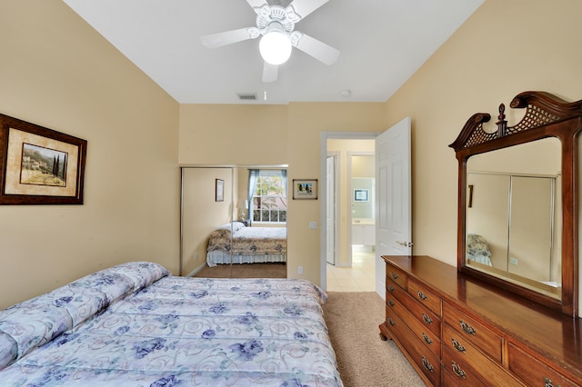 bedroom with light colored carpet and ceiling fan