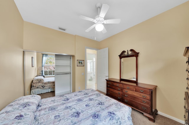 carpeted bedroom with ceiling fan