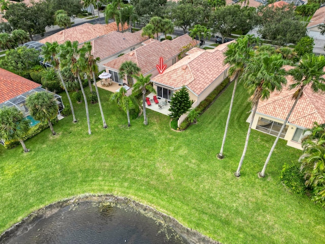 bird's eye view with a water view