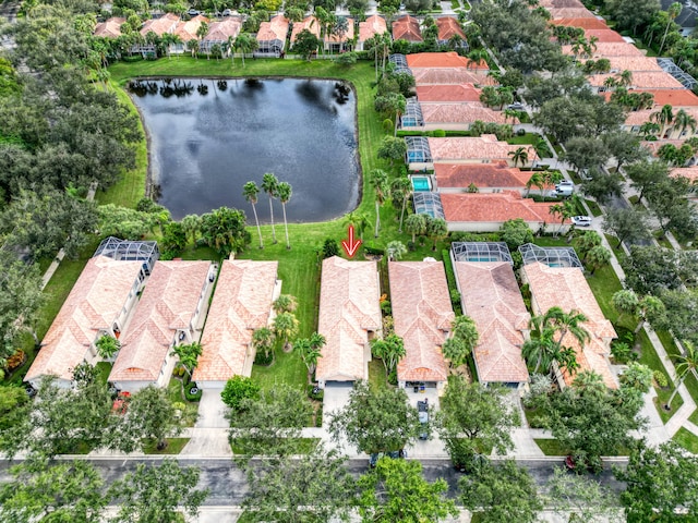 bird's eye view with a water view