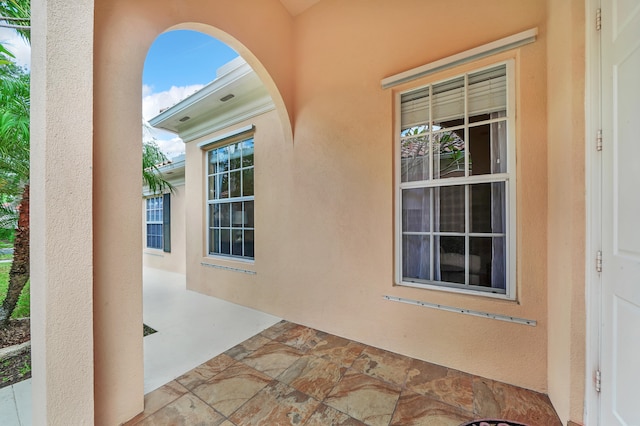 doorway to property with a patio area