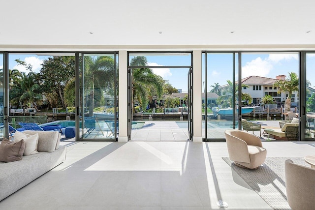 doorway with floor to ceiling windows