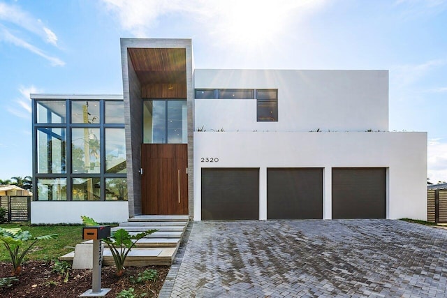 view of front of property with a garage