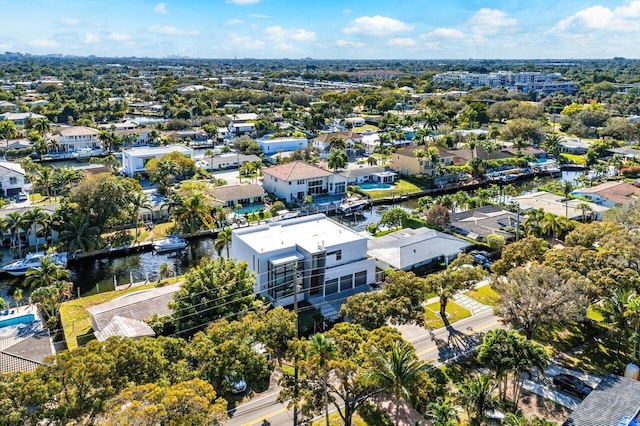 bird's eye view with a water view