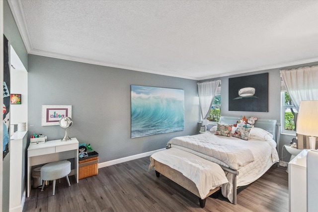 bedroom with a textured ceiling, crown molding, multiple windows, and dark wood-type flooring