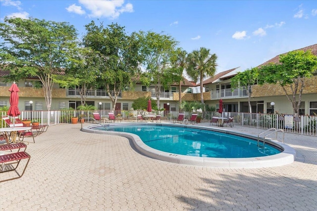 view of swimming pool featuring a patio