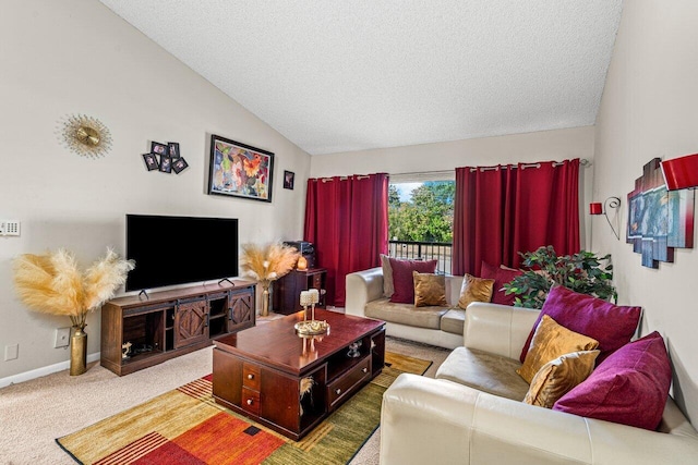 living room with carpet, lofted ceiling, and a textured ceiling