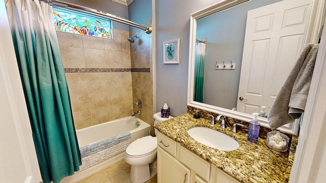 full bathroom with vanity, tile patterned flooring, shower / bath combination with curtain, and toilet