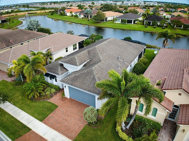 bird's eye view with a water view