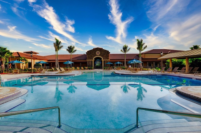 view of swimming pool with a patio