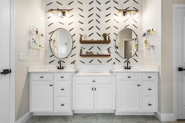 bathroom with tile patterned floors and vanity