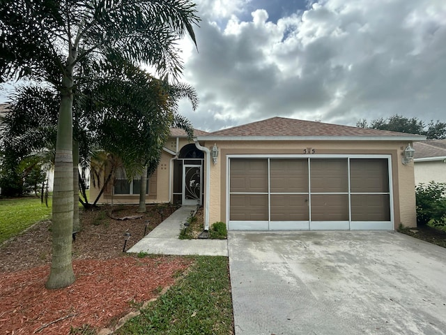 view of front of home featuring a garage