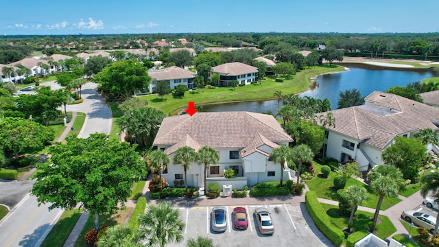 birds eye view of property featuring a water view