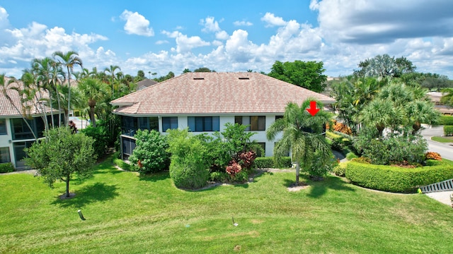 view of front of home with a front yard