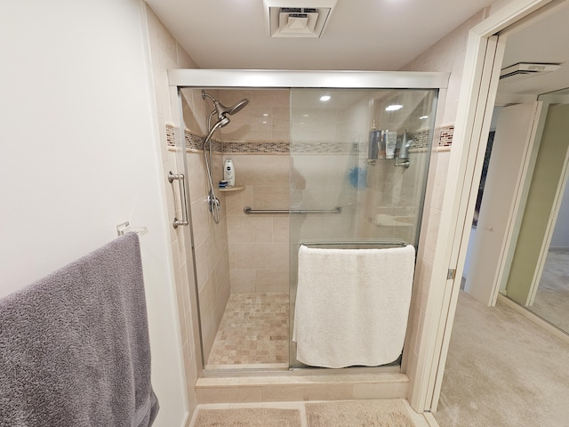 bathroom with an enclosed shower